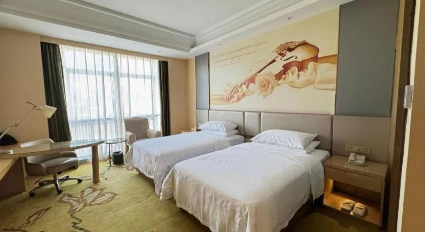 Bed in Vienna Hotel Fuzhou Changle Zhenghe Metro Station