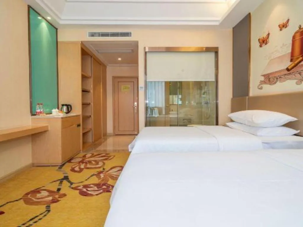 Bed in Vienna Hotel Fuzhou Changle Zhenghe Metro Station