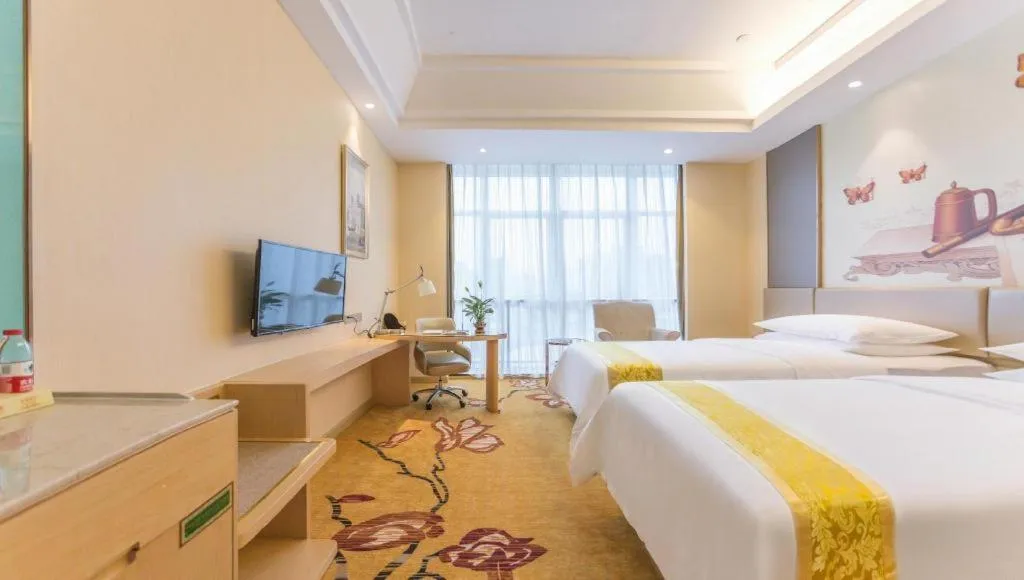 Bed in Vienna Hotel Fuzhou Changle Zhenghe Metro Station