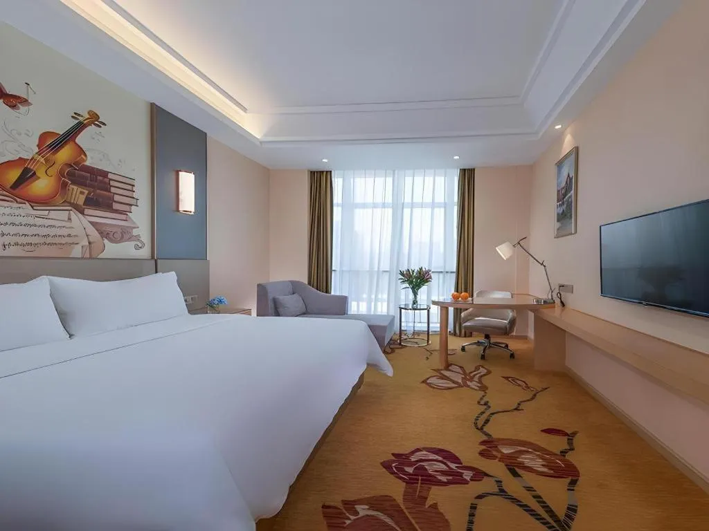 Bed in Vienna Hotel Fuzhou Changle Zhenghe Metro Station
