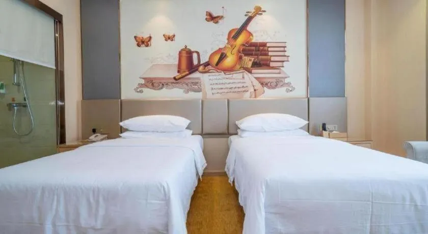 Bed in Vienna Hotel Fuzhou Changle Zhenghe Metro Station