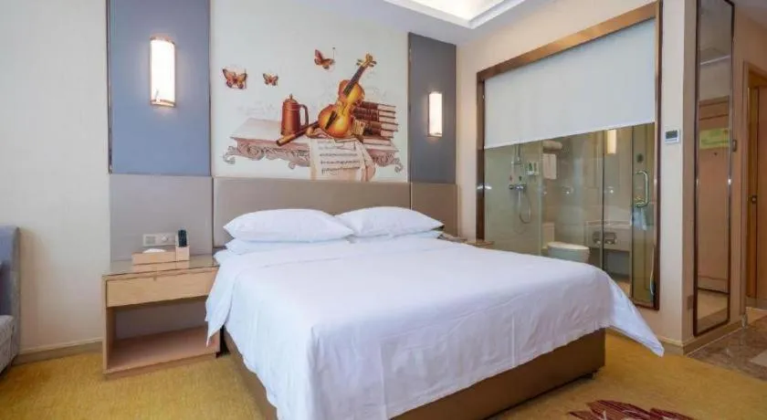 Bed in Vienna Hotel Fuzhou Changle Zhenghe Metro Station