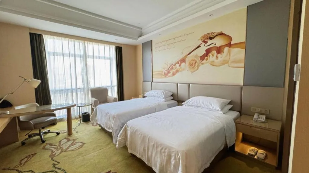 Bed in Vienna Hotel Fuzhou Changle Zhenghe Metro Station