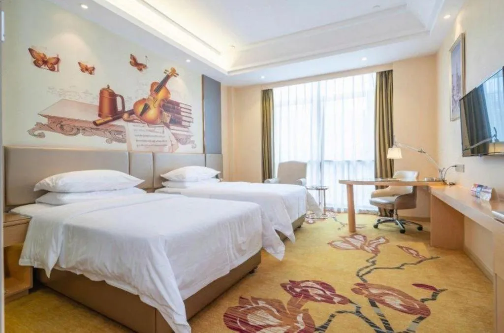 Bed in Vienna Hotel Fuzhou Changle Zhenghe Metro Station