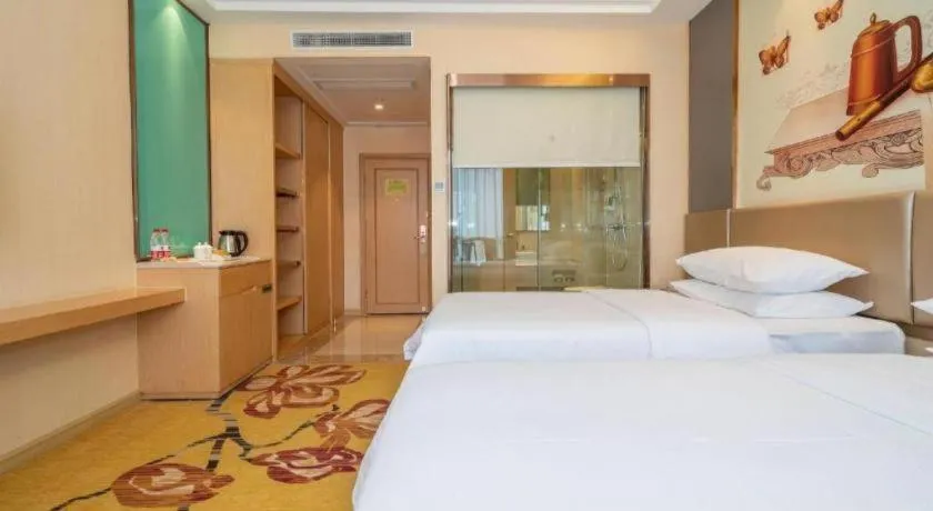 Bed in Vienna Hotel Fuzhou Changle Zhenghe Metro Station