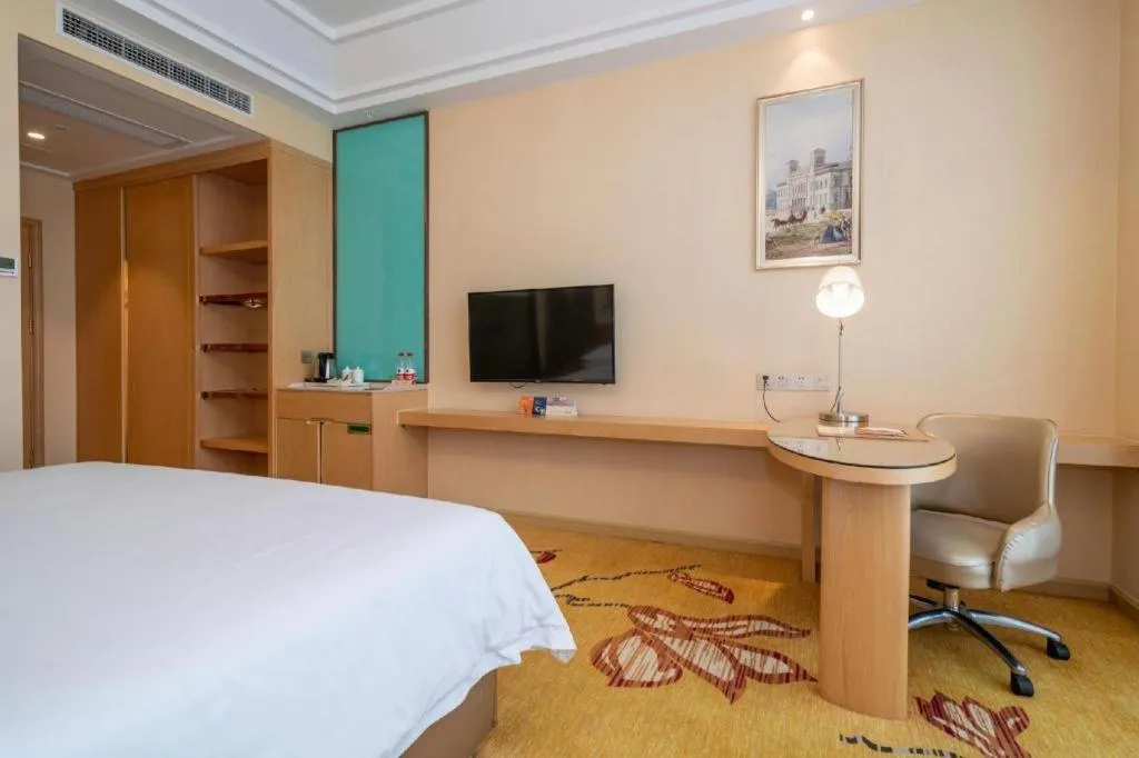 Bed in Vienna Hotel Fuzhou Changle Zhenghe Metro Station