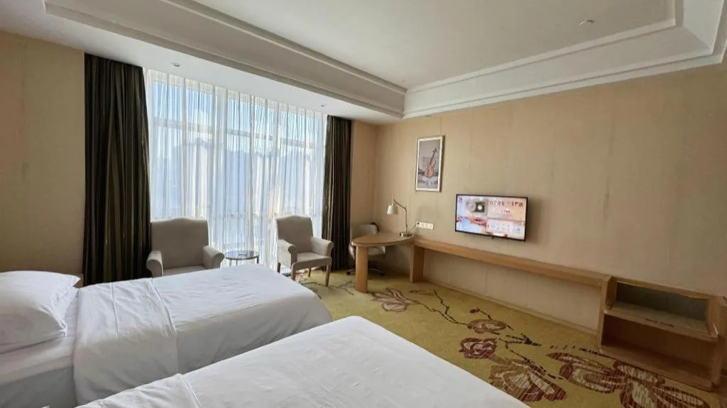 Bed in Vienna Hotel Fuzhou Changle Zhenghe Metro Station