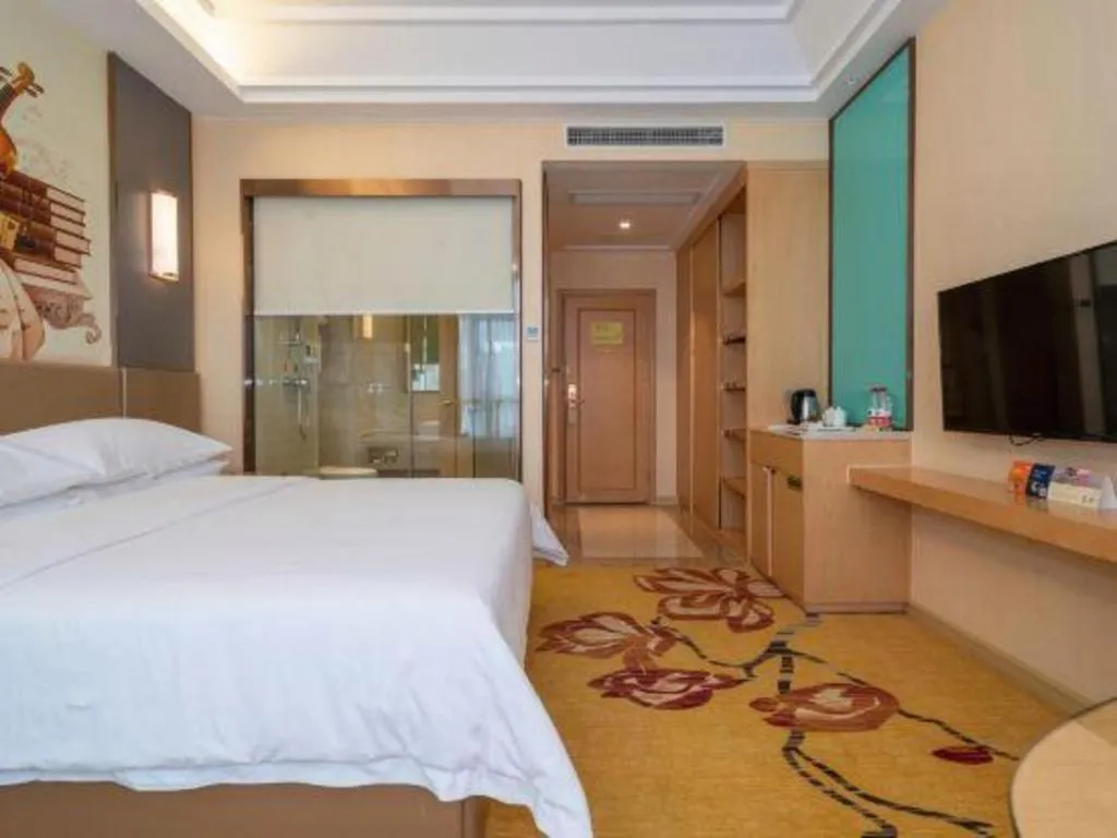 Bed in Vienna Hotel Fuzhou Changle Zhenghe Metro Station