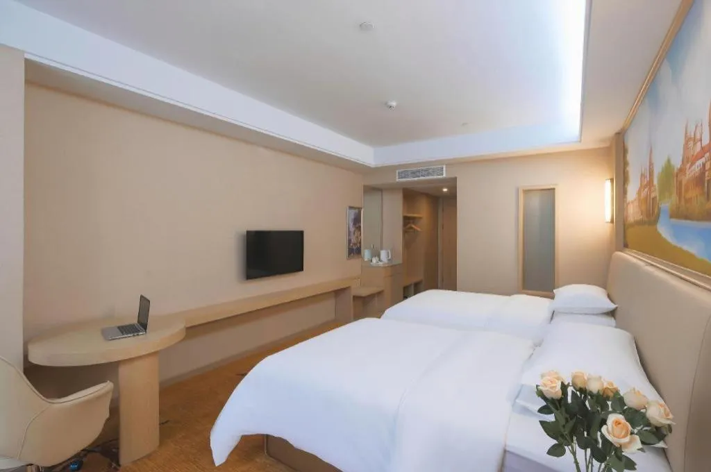 Bed in Vienna Hotel Zhejiang Tongxiang Puyuan