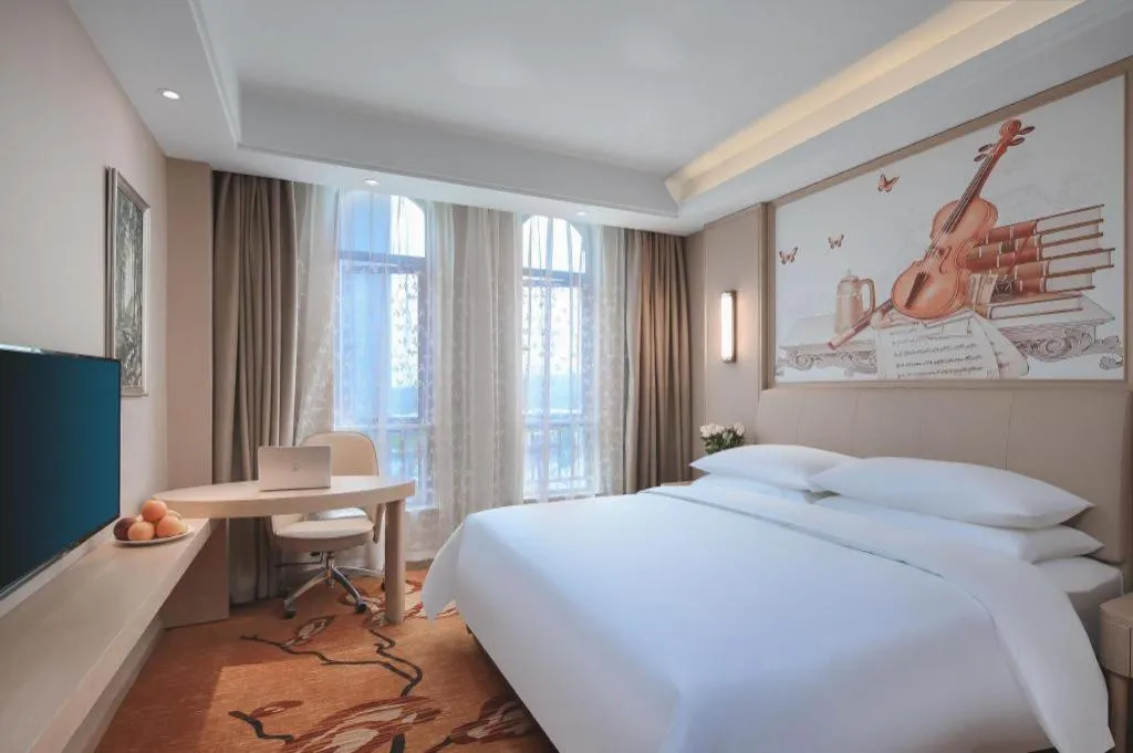 Bed in Vienna Hotel Zhejiang Tongxiang Puyuan