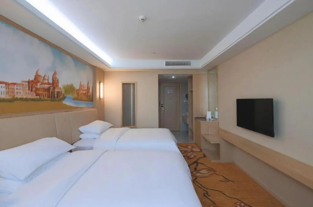 Bed in Vienna Hotel Zhejiang Tongxiang Puyuan