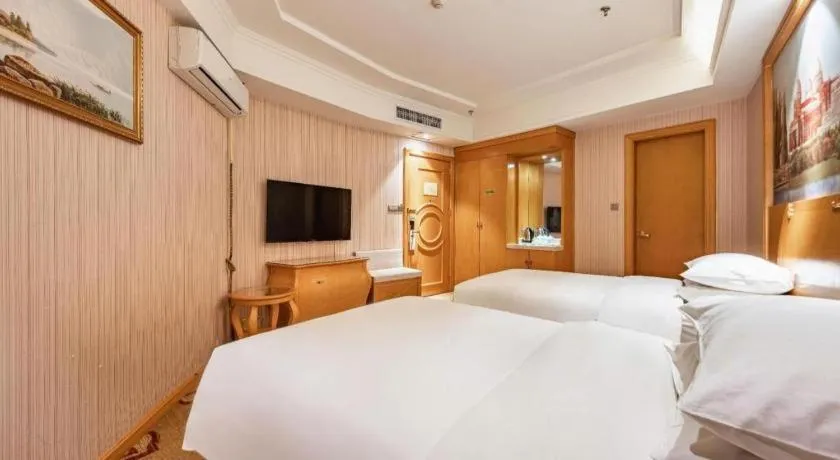 Bed in Vienna Hotel Qinghai Xining Wanda Plaza