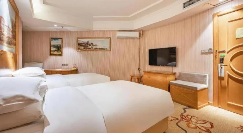 Bed in Vienna Hotel Qinghai Xining Wanda Plaza