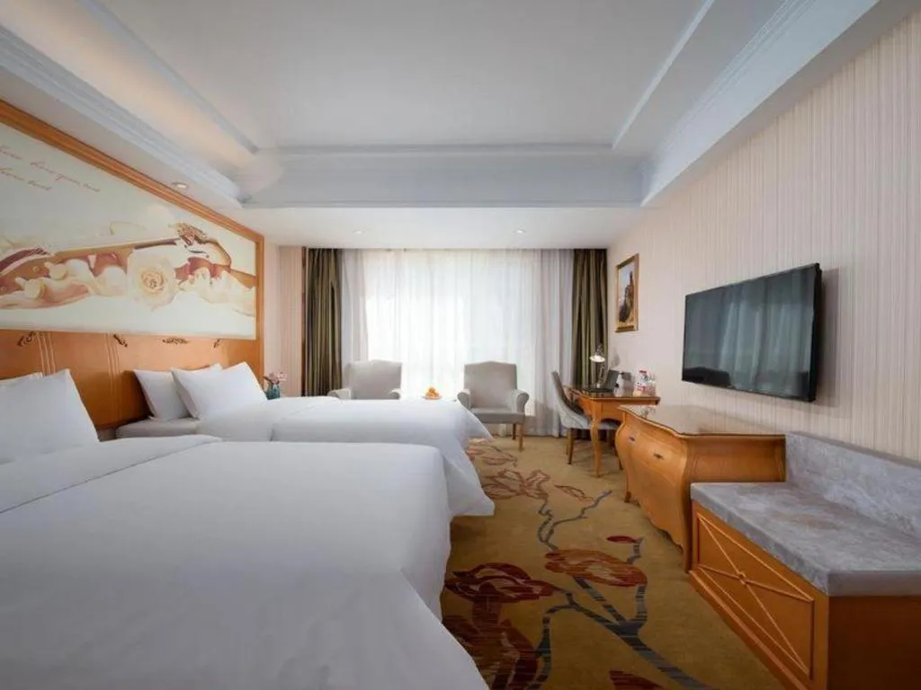 Bed in Vienna Hotel Qinghai Xining Wanda Plaza