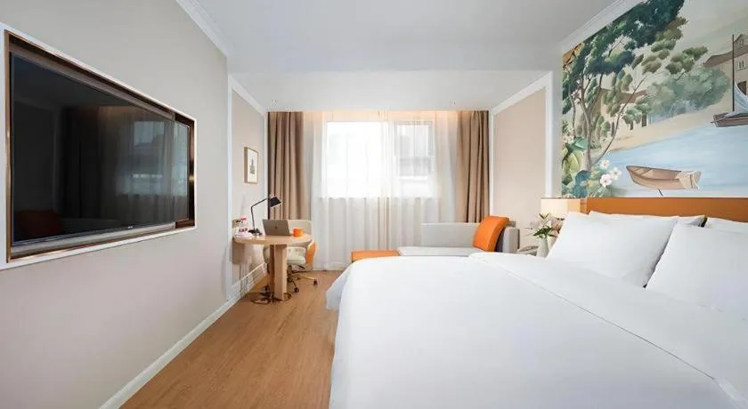 Bed in Vienna Hotel Tianjin Chentangzhuang Metro Station