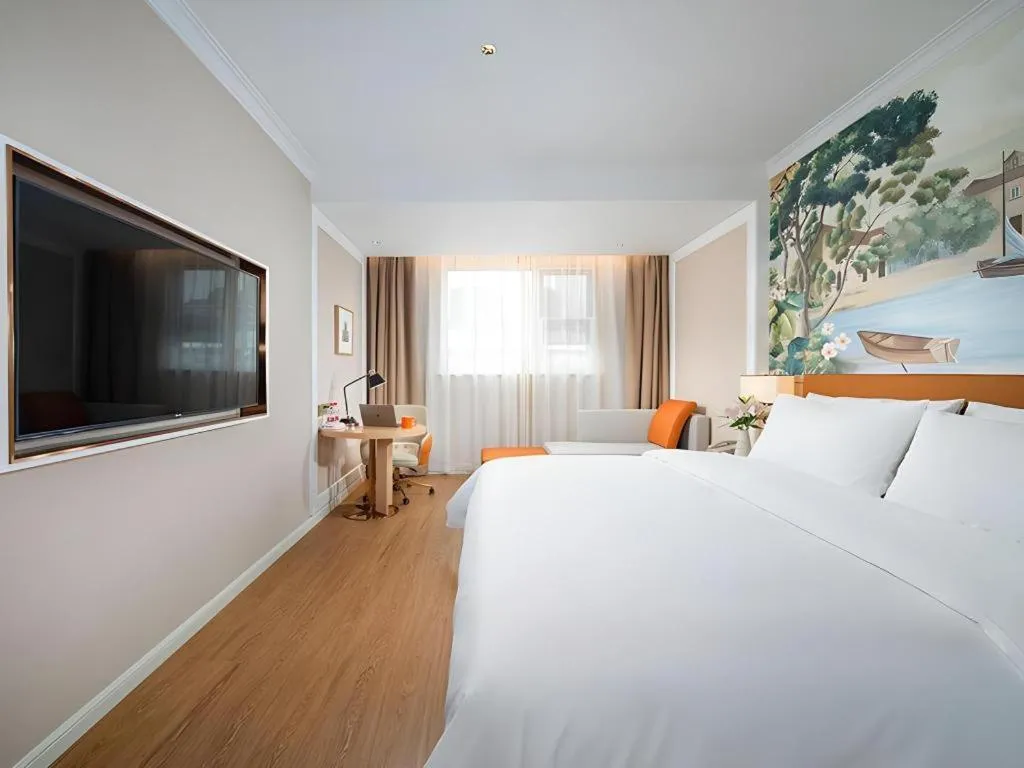 Bed in Vienna Hotel Tianjin Chentangzhuang Metro Station