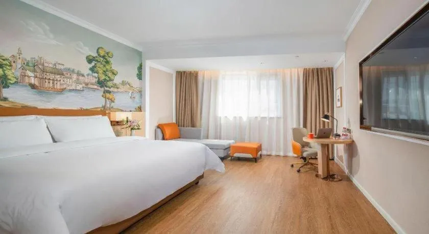 Bed in Vienna Hotel Tianjin Chentangzhuang Metro Station