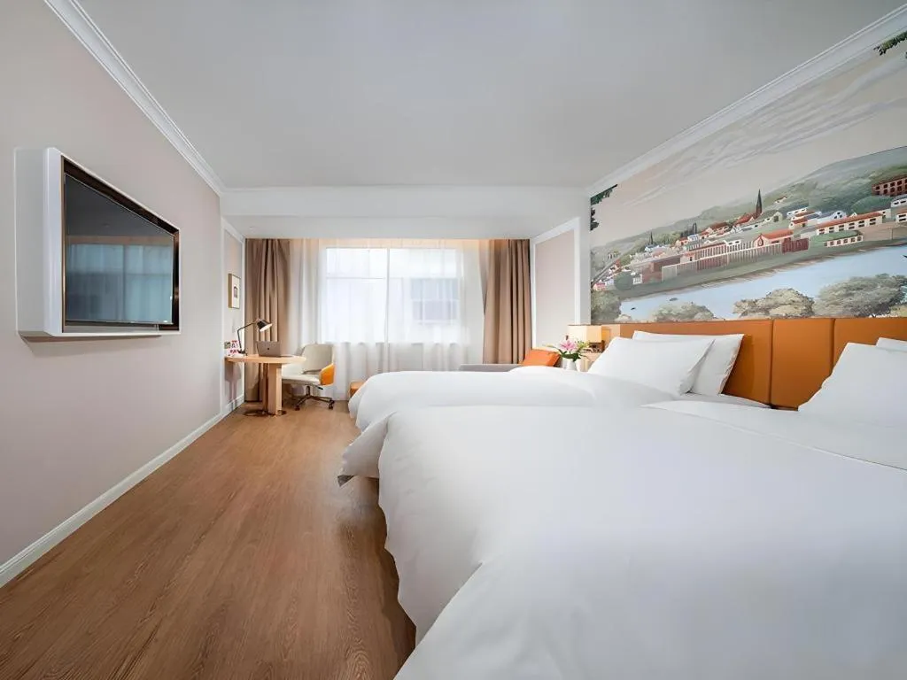 Bed in Vienna Hotel Tianjin Chentangzhuang Metro Station