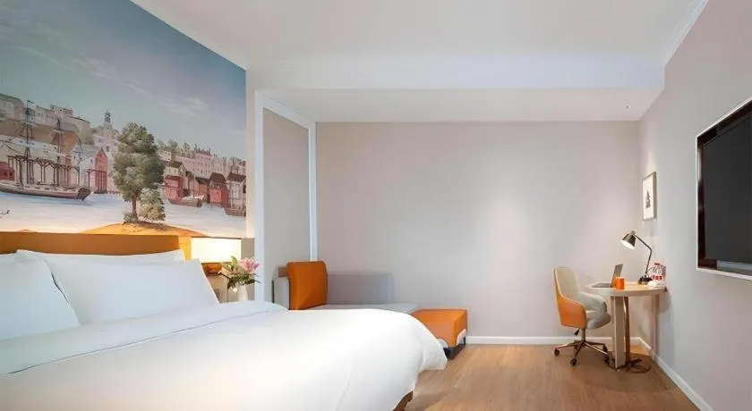 Bed in Vienna Hotel Tianjin Chentangzhuang Metro Station