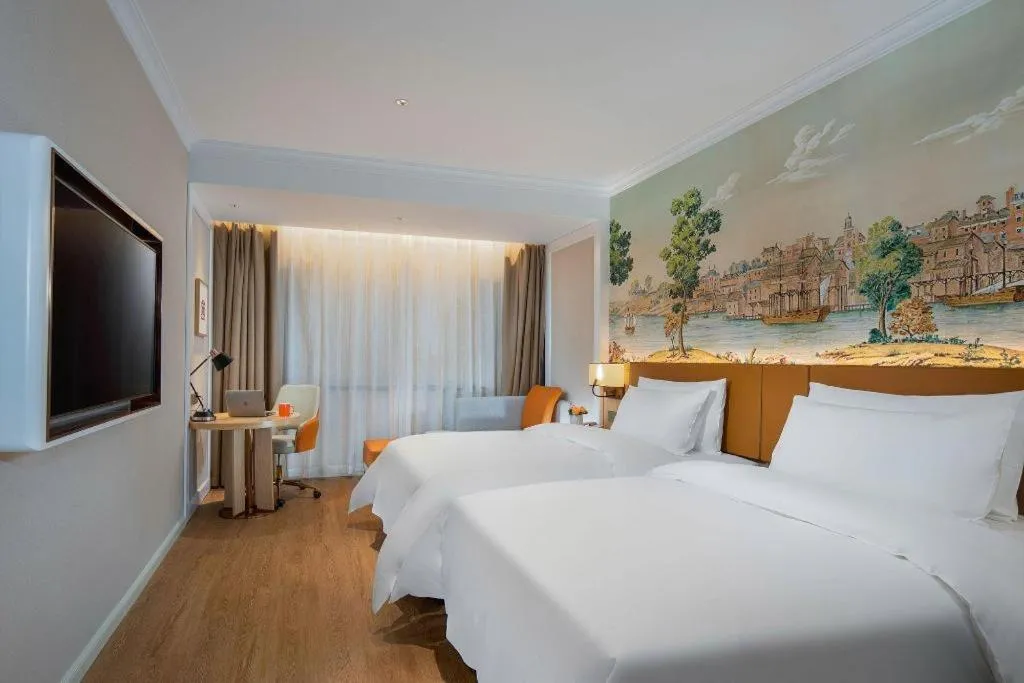 Bed in Vienna Hotel Tianjin Chentangzhuang Metro Station