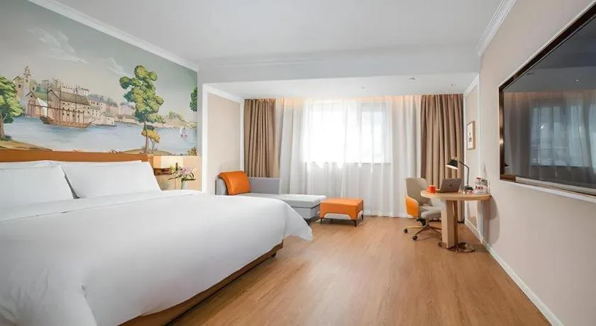 Bed in Vienna Hotel Tianjin Chentangzhuang Metro Station