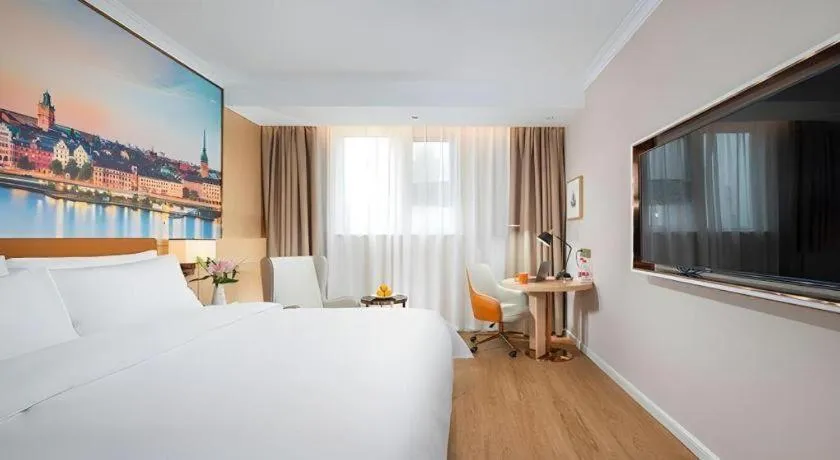 Bed in Vienna Hotel Tianjin Chentangzhuang Metro Station