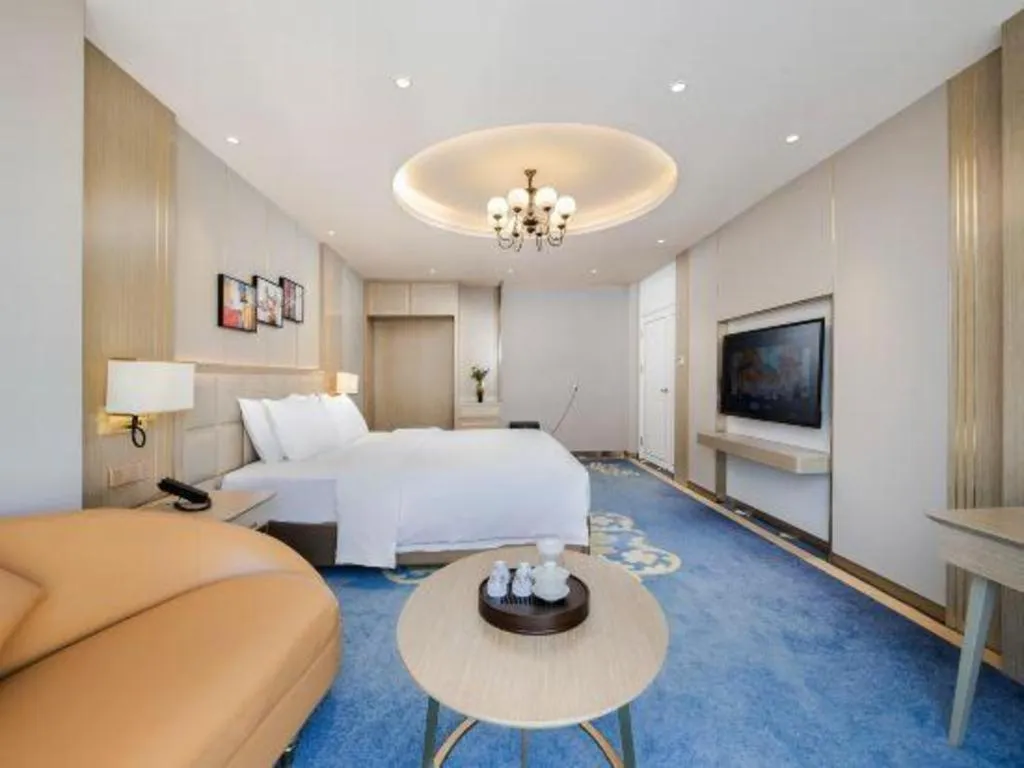 Bed in Vienna Hotel Yunnan Maitreya Huquan