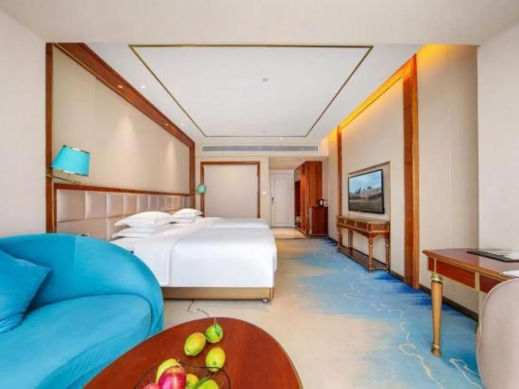 Bed in Vienna Hotel Yunnan Maitreya Huquan