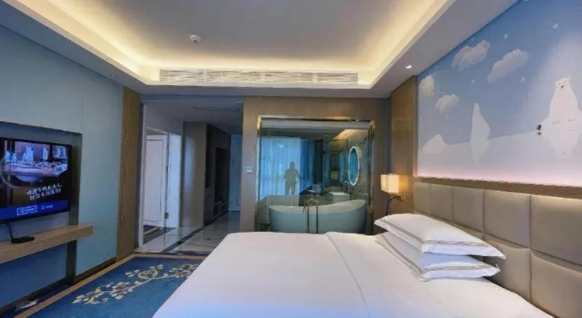 Bed in Vienna Hotel Yunnan Maitreya Huquan