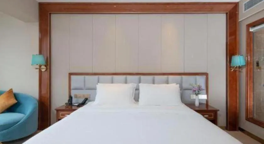 Bed in Vienna Hotel Yunnan Maitreya Huquan