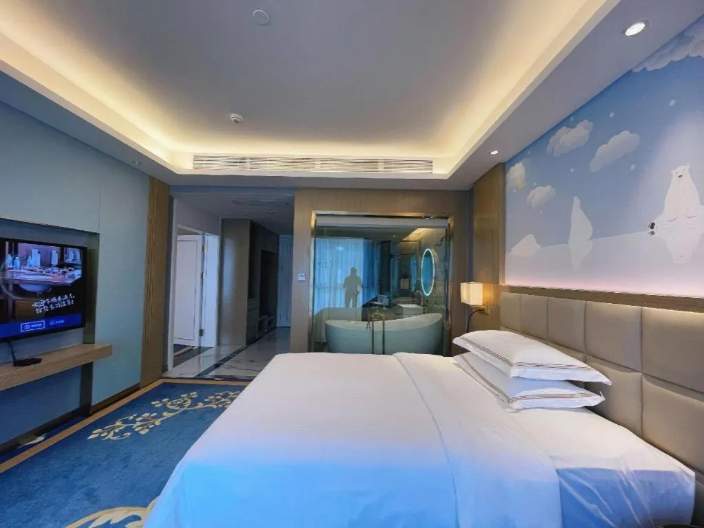 Bed in Vienna Hotel Yunnan Maitreya Huquan