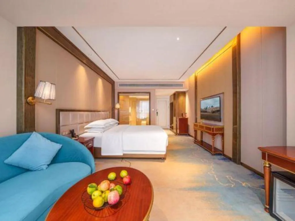 Bed in Vienna Hotel Yunnan Maitreya Huquan