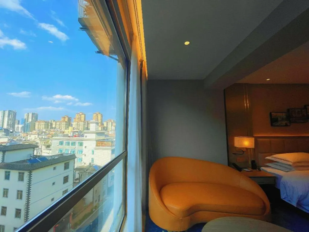 Bed in Vienna Hotel Yunnan Maitreya Huquan