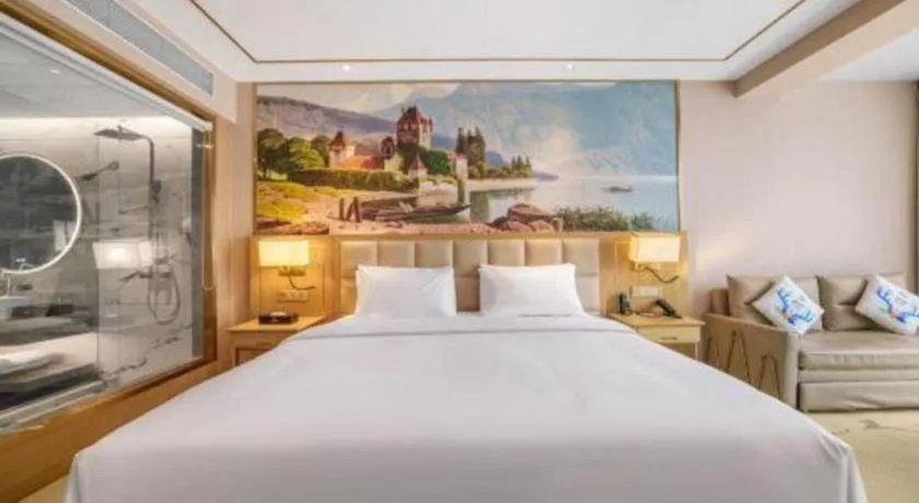 Bed in Vienna Hotel Yunnan Maitreya Huquan