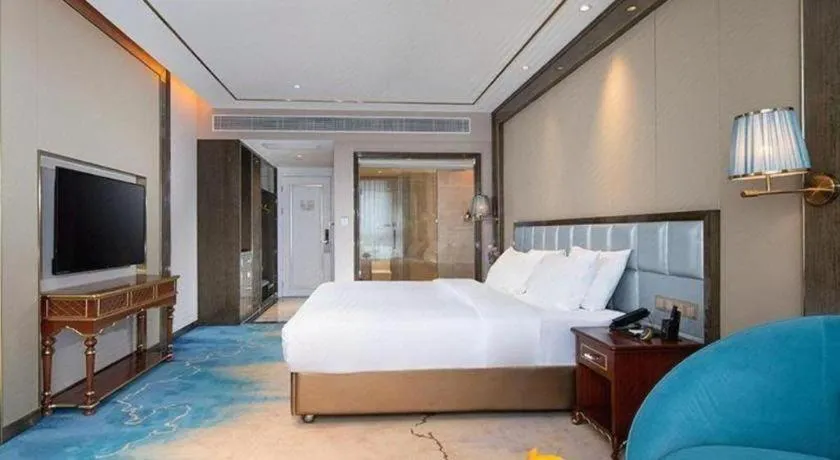 Bed in Vienna Hotel Yunnan Maitreya Huquan