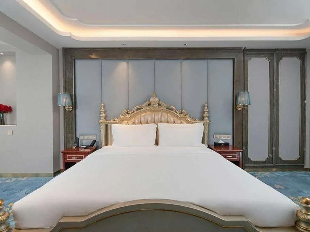 Bed in Vienna Hotel Yunnan Maitreya Huquan