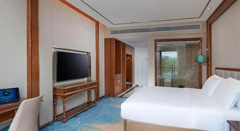 Bed in Vienna Hotel Yunnan Maitreya Huquan