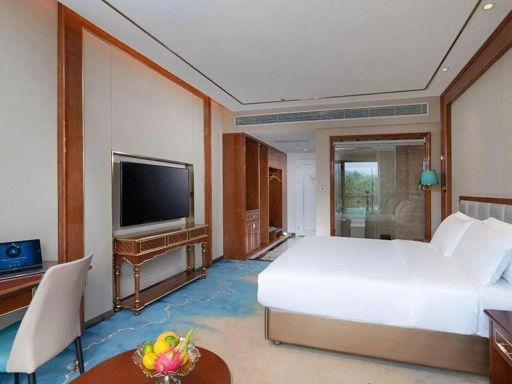 Bed in Vienna Hotel Yunnan Maitreya Huquan