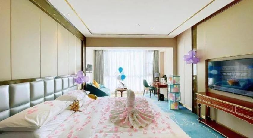 Bed in Vienna Hotel Yunnan Maitreya Huquan