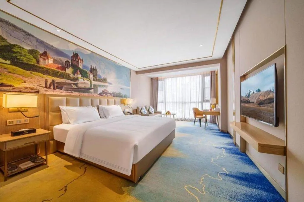 Bed in Vienna Hotel Yunnan Maitreya Huquan