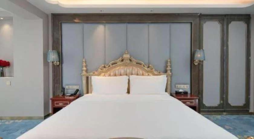 Bed in Vienna Hotel Yunnan Maitreya Huquan