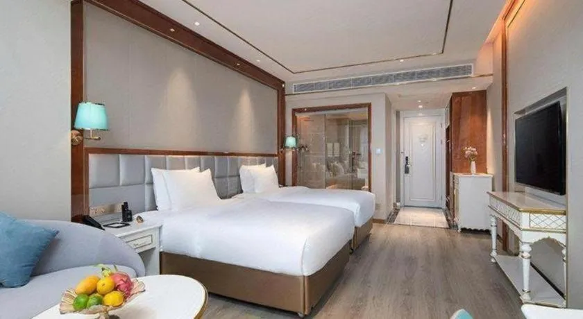 Bed in Vienna Hotel Yunnan Maitreya Huquan