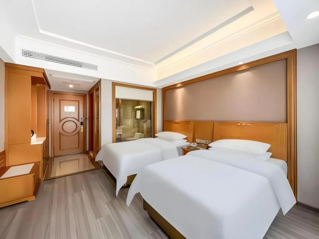 Bed in Vienna Hotel Anhui Xuancheng High-Speed Railway Station