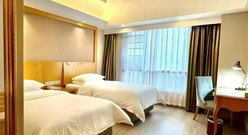 Bed in Vienna Hotel Anhui Xuancheng High-Speed Railway Station