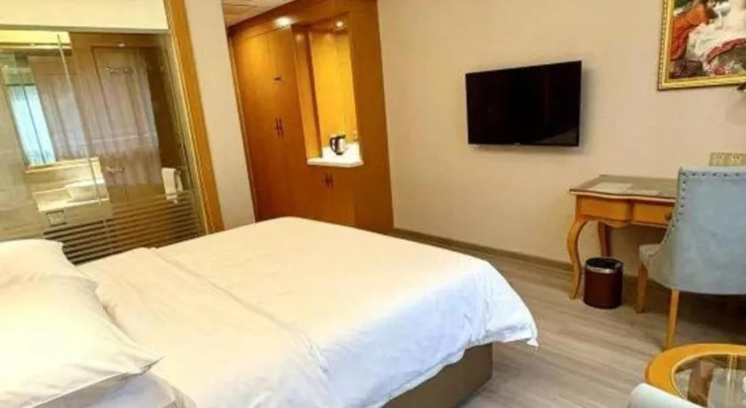Bed in Vienna Hotel Anhui Xuancheng High-Speed Railway Station