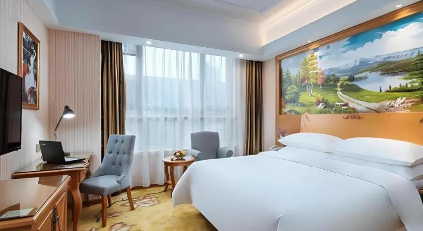 Bed in Vienna Hotel Anhui Xuancheng High-Speed Railway Station