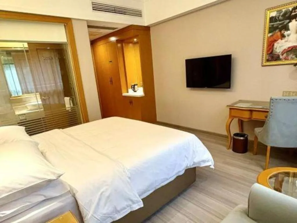 Bed in Vienna Hotel Anhui Xuancheng High-Speed Railway Station