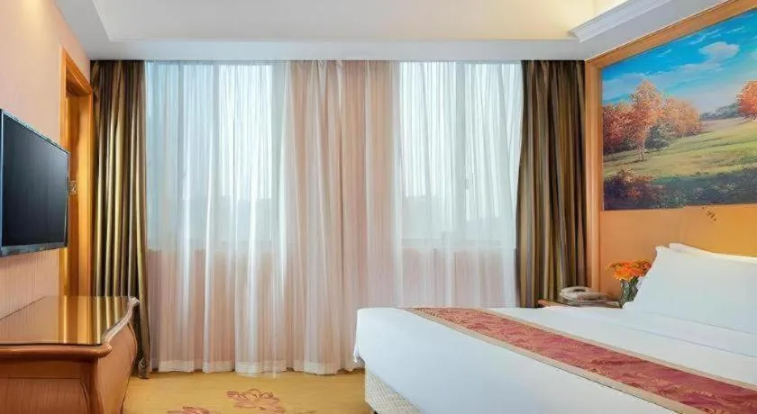 Bed in Vienna Hotel Hubei Macheng Cultural Town