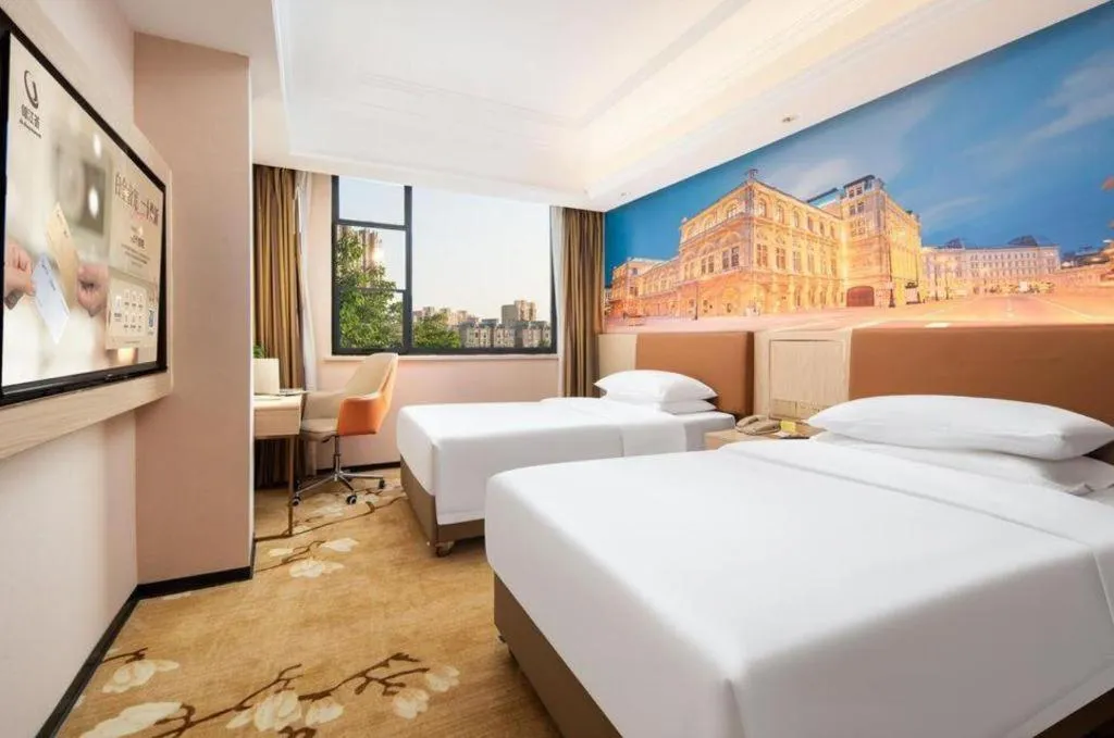 Bed in Vienna Hotel Hubei Macheng Cultural Town