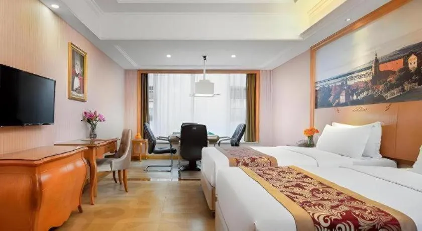 Bed in Vienna Hotel Hubei Macheng Cultural Town